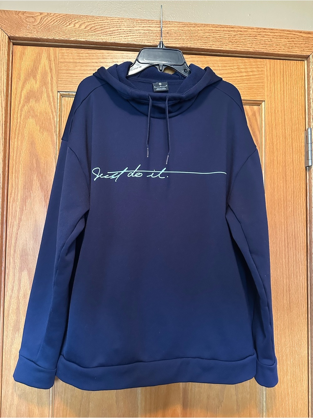 Women’s Nike Navy Blue Hoodie with Light Blue Script Logo